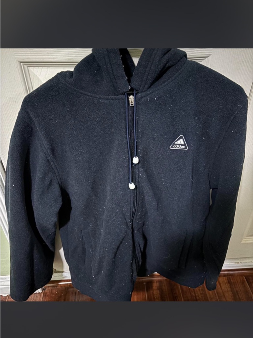 Navy blue zip-up hoodie from Adidas
